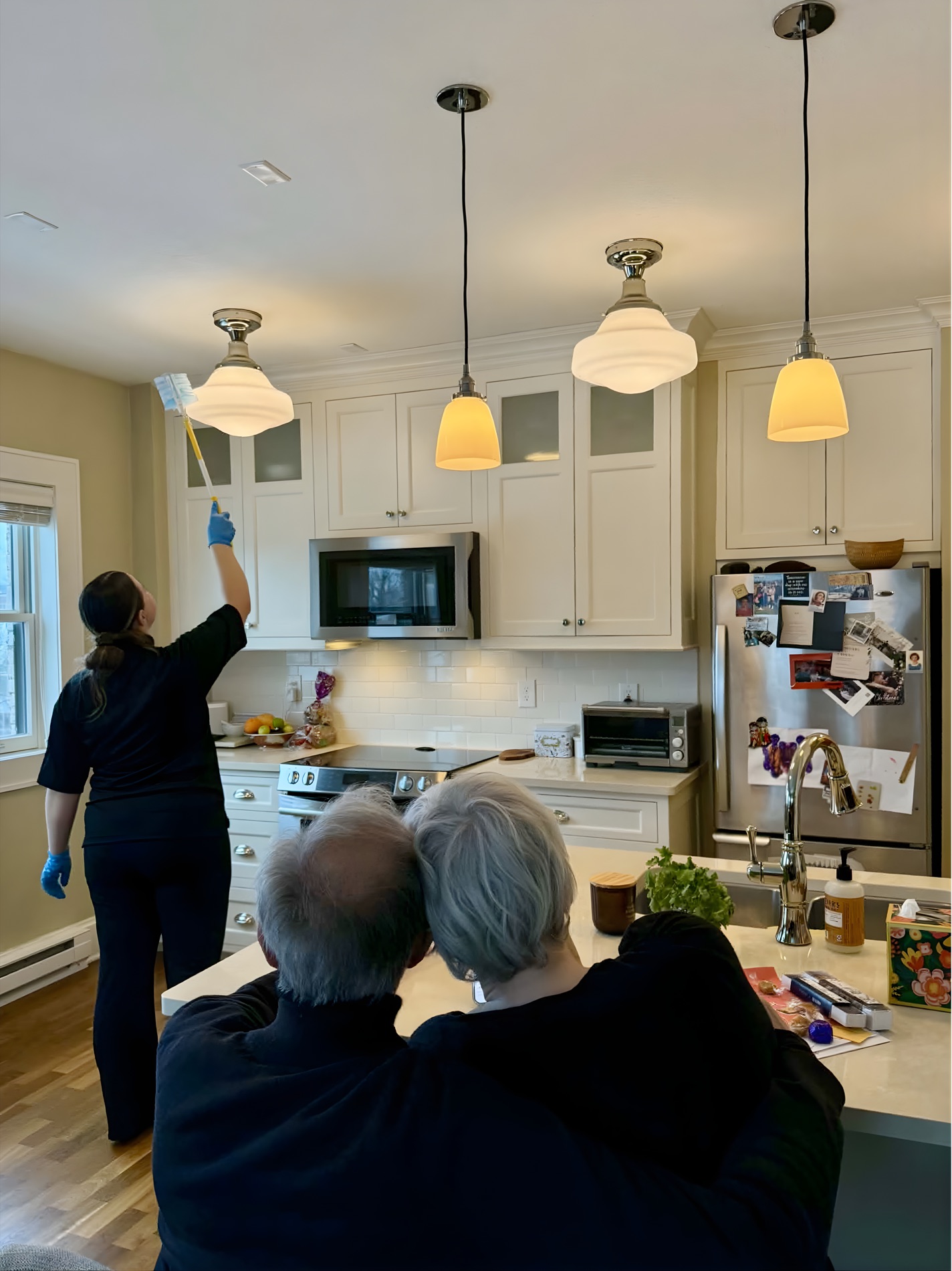 A Grime Guardians professional detailing a Twin Cities home while the homeowners relax